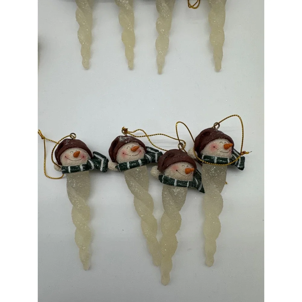 Sixteen snowman ornaments.‎ 4 sets of 4 snowman.